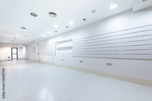 Spacious empty apartment with white interiors photo