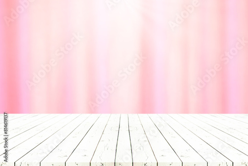 Perspective white wooden table on top over blur natural background, can be used mock up for montage products display or design layout.