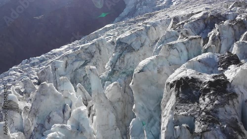 Caucasus, North Ossetia. Genaldon gorge. Fractures on the Maili glacier.