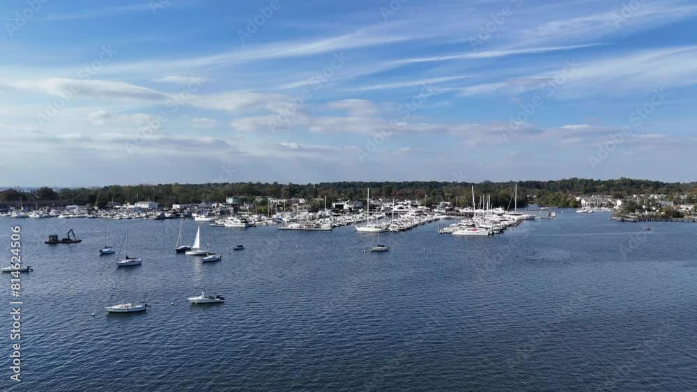 Drone shot over a harbor with boats and houses on a sunny day at Put-in-Bay Drone shot over a harbor with boats and houses on a sunny day at Put-in-Bay