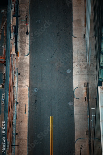 the top view of a car traveling down the road with traffic in the city photo