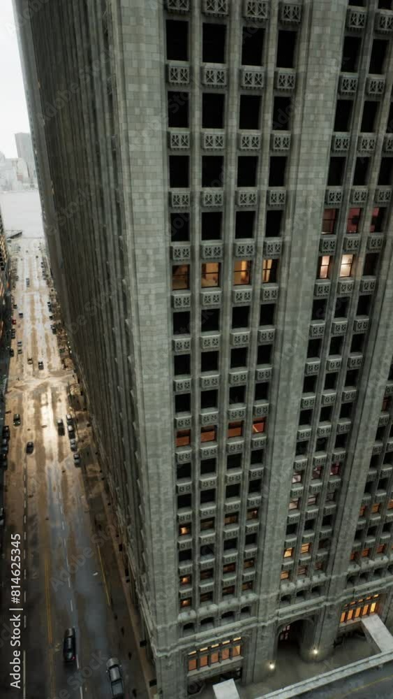 Aerial hyperlapse of busy car traffic in between Skyscrapers of modern urban metropolis city center