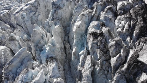 Caucasus, North Ossetia. Genaldon gorge. Fractures on the Maili glacier.