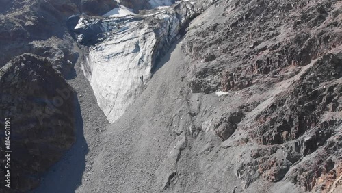 Caucasus, North Ossetia. Genaldon gorge. Glacier on the mountainside.