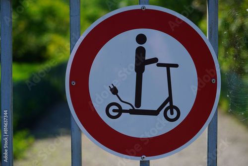 E-scooter prohibition sign on pedestrian path, electric push scooters banned, Hannover, Germany.