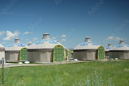 Slika na platnu Row of colorful yurts in Hulunbuir prairie region, China