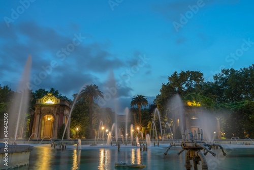 Fountain and water jets in Dona Casilda de Iturrizar Park at night in Vizcaya, Basque Country, Spain photo