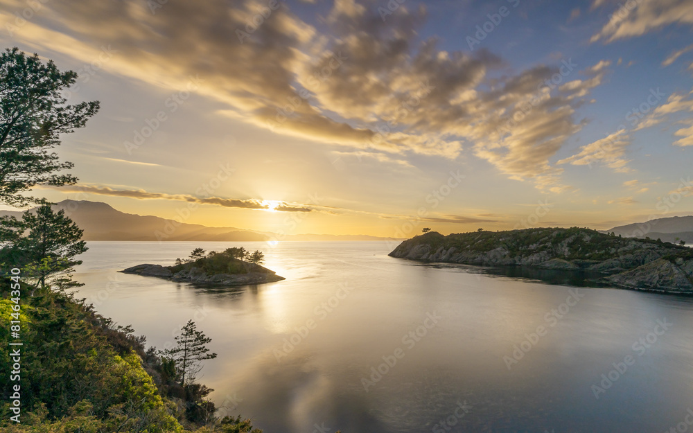 A spectacular sunset in Norway over the bay, islands and fjords