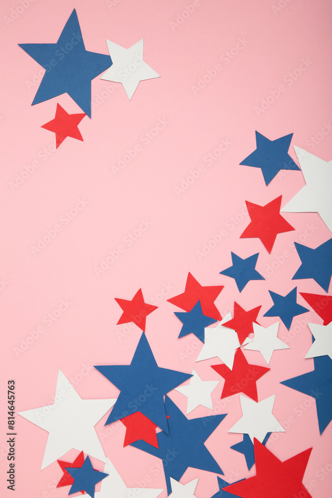 American independence day, celebration, patriotism and holidays concept - red, white and blue paper stars on pink background. American independence day, celebration, patriotism and holidays concept - red, white and blue paper stars on pink background.