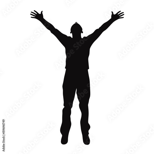 Man Standing with Arms Raised in Silhouette