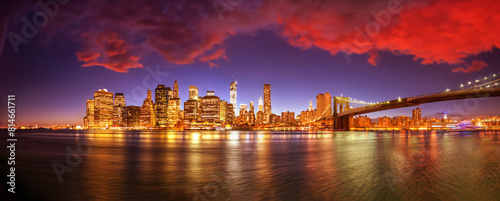 Downtown Manhattan night lights  panoramic view from Brooklyn Bridge Park
