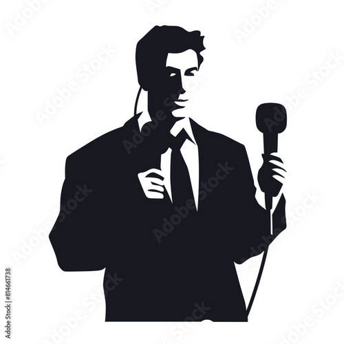 Silhouette of Man Speaking with Microphone