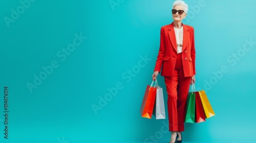 Elegant Senior Lady with Shopping Bags photo