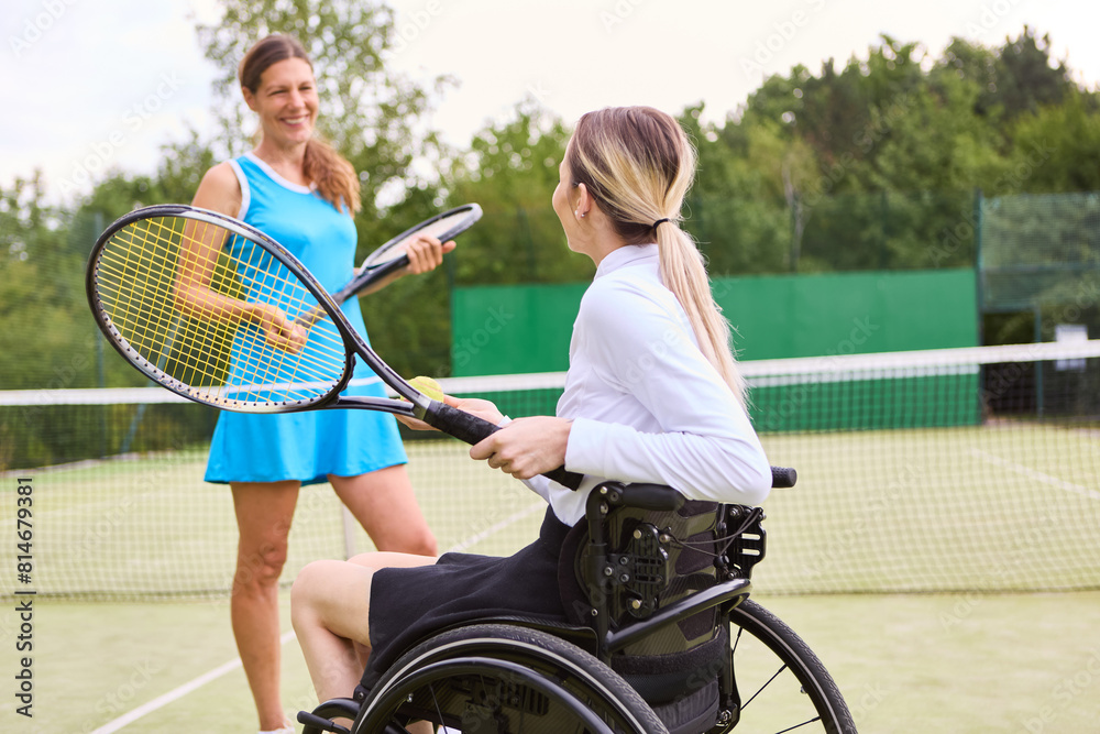 Active lifestyle and inclusion: Person in wheelchair playing tennis with partner on outdoor court