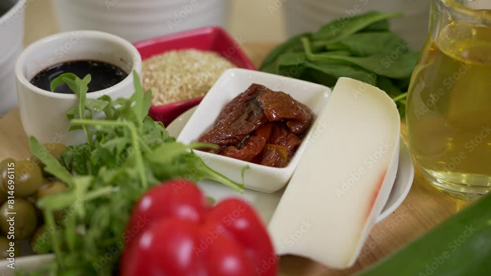 Different fresh vegetables, greens and cheese as ingredients Different fresh vegetables, greens and cheese as ingredients