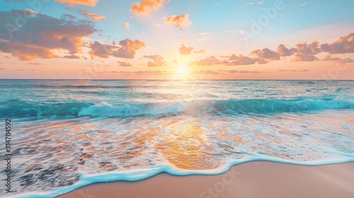 Glorious sunrise over tranquil ocean waves on sandy beach