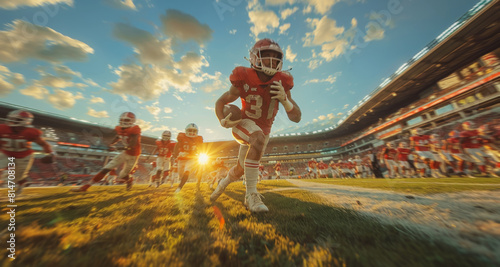 A group of football players in action, sprinting across the field during a beautiful sunset. photo