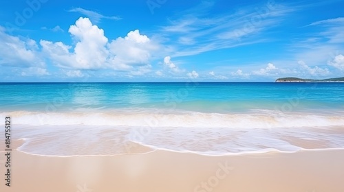 A wide panorama of a serene beach with glistening sand  gentle ocean waves  and a beautiful blue sky.