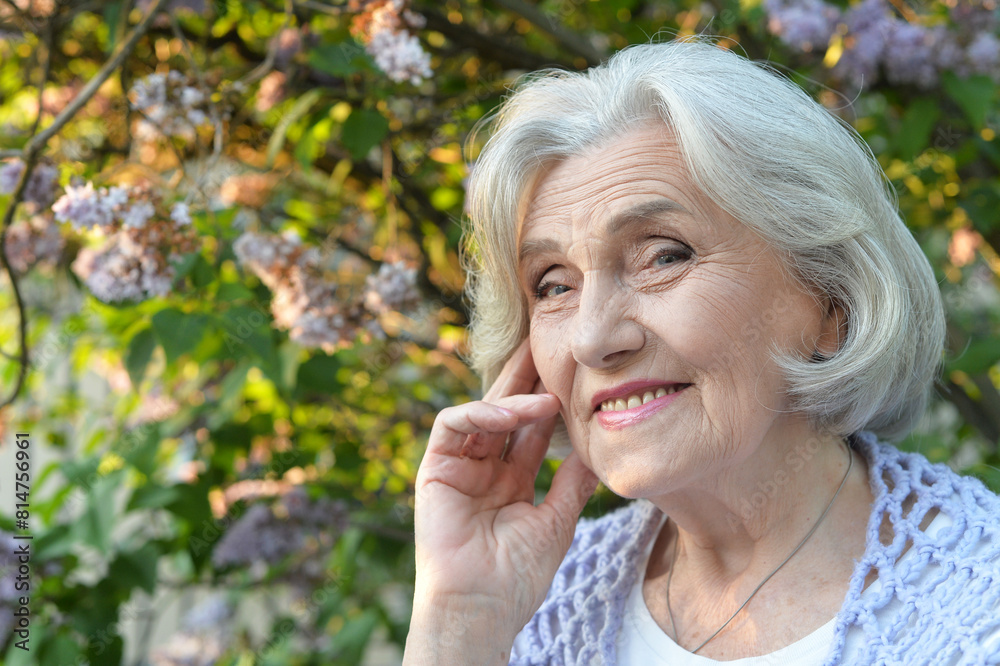 Portrait of a beautiful woman in the park in summer Portrait of a beautiful woman in the park in summer