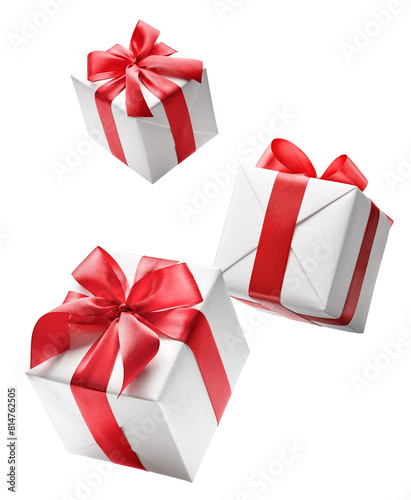Fotografie White gift boxes with red bow