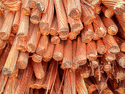 Detailed close-up of a heap of frayed and cut copper wires with visible strands and natural oxidation.
