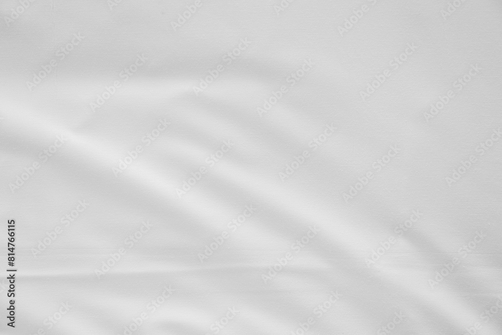 Close up white wrinkled fabric texture rippled surface, Soft focus. Close up white wrinkled fabric texture rippled surface, Soft focus.