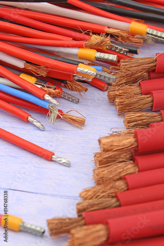 Copper electrical wiring wires in colored insulation for connecting electrical equipment. Close-up. Soft focus. photo