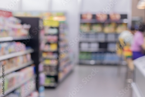 Wallpaper Mural Abstract blurred supermarket aisle with colorful shelves and unrecognizable customers as background Torontodigital.ca