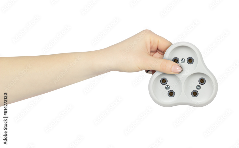 Plastic tee for socket in hand, outstretched hand with tee for socket isolated from background Plastic tee for socket in hand, outstretched hand with tee for socket isolated from background