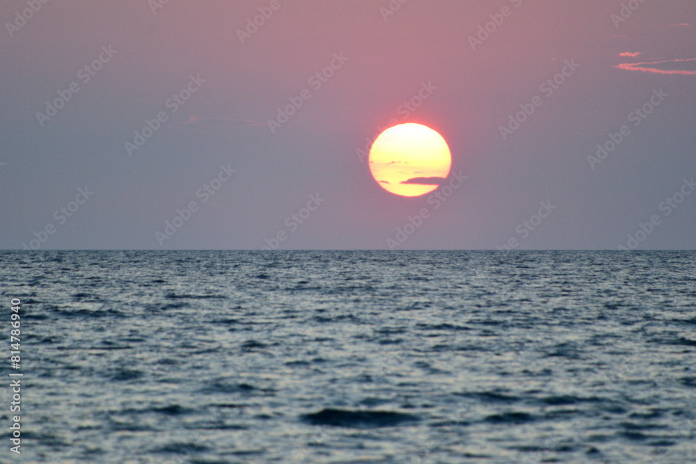 Sunset over the sea - Zematas Beach, Lemnos, Greece, Aegean Sea Sunset over the sea - Zematas Beach, Lemnos, Greece, Aegean Sea