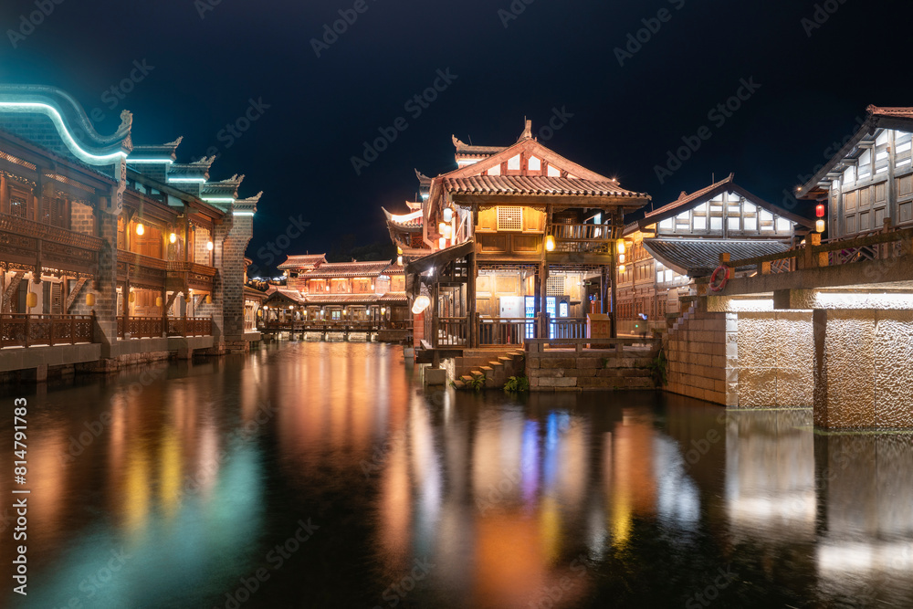 Obraz premium At night, the beautiful ancient town of Lizhuang on the lake, Yibin City, Sichuan Province, China
