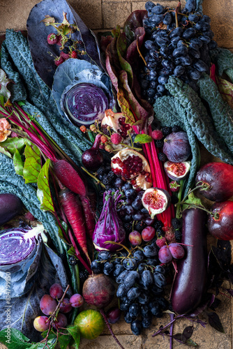 Autumn still life with vegetables and fruit in purple