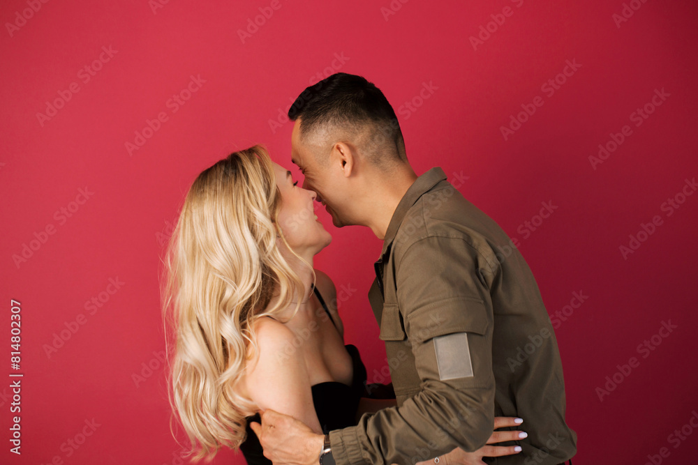 Portrait of a young positive, cheerful, international couple Portrait of a young positive, cheerful, international couple