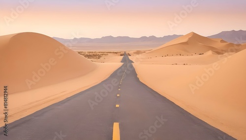 A remote desert road bordered by towering sand dun upscaled_2 photo