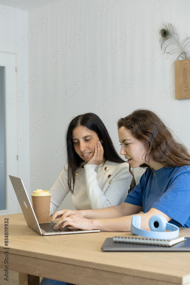 concentrated students working from home with the computer concentrated students working from home with the computer