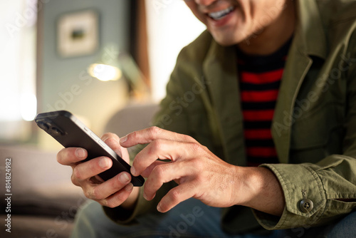 man using cell phone holding mobile texting message contact us.chatting,search internet shopping online.technology device communication connecting