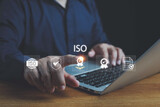 ISO standards quality control, assurance and warranty business technology concept. Touching on screen with ISO and globe icons on smart background. ISO Standard certification. Modern ISO banner.