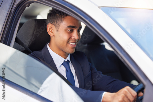 Happy businessman, driving and commute with car for travel, destination or transport in city. Man, driver or employee on route to work with smile for business trip, opportunity or location in vehicle © peopleimages.com