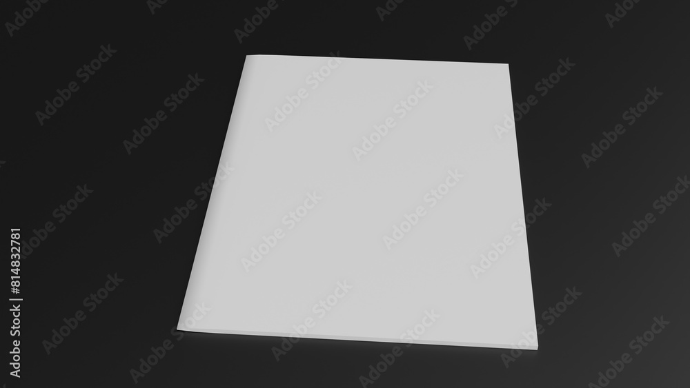 a blank white book on a black surface a blank white book on a black surface