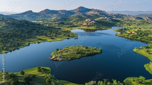 Aerial view of the Wichita Mountains in Oklahoma, USA, featuring rugged terrain and natural lakes, a sanctuary for wildli photo