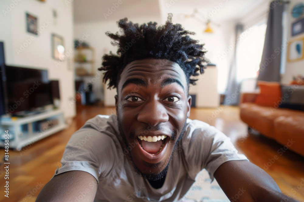 Realistic phone selfie made by a young african american man at home without filters Realistic phone selfie made by a young african american man at home without filters
