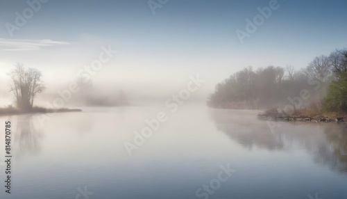 A misty morning on the river with fog hovering ju
