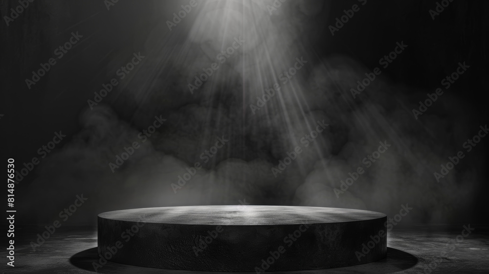 A black stage with a spotlight shining on it