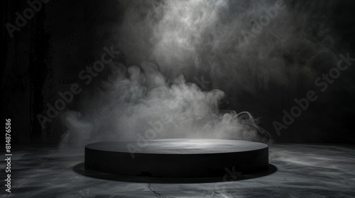 A black, empty stage with a large amount of smoke photo