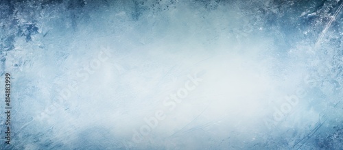 A copy space image featuring the textured blue surface of an ice rink showcasing scratches from skating and hockey
