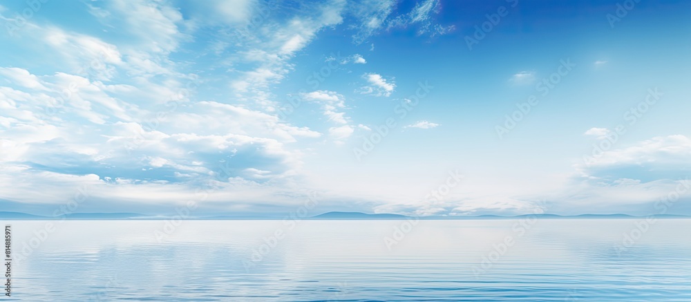 The sky merges with the calm sea providing a serene and tranquil copy space image The sky merges with the calm sea providing a serene and tranquil copy space image