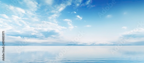 The sky merges with the calm sea providing a serene and tranquil copy space image