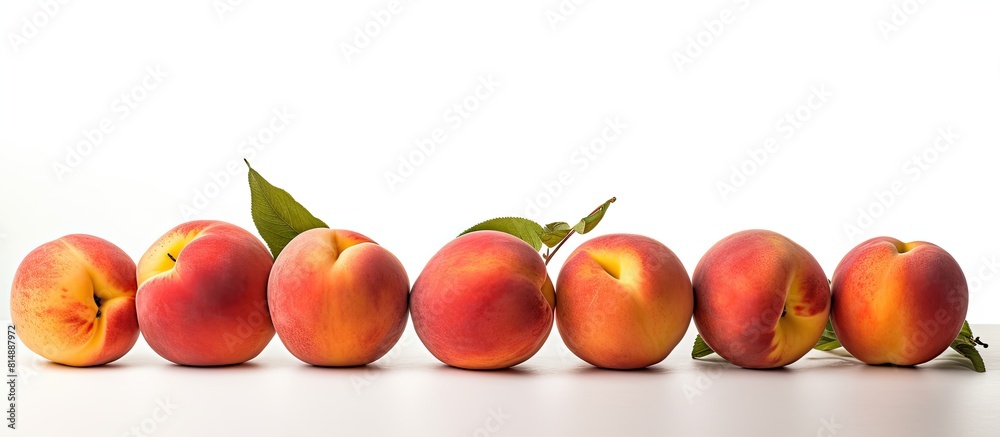 Copy space image of ripe peaches showcased against a stark white backdrop Copy space image of ripe peaches showcased against a stark white backdrop