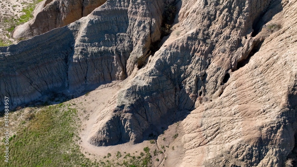 Looking down on Badlands South Dakota eroding rock formations and sedimentation soil layers with prehistoric fossilized remains in Butte where inland sea was 75 million years ago