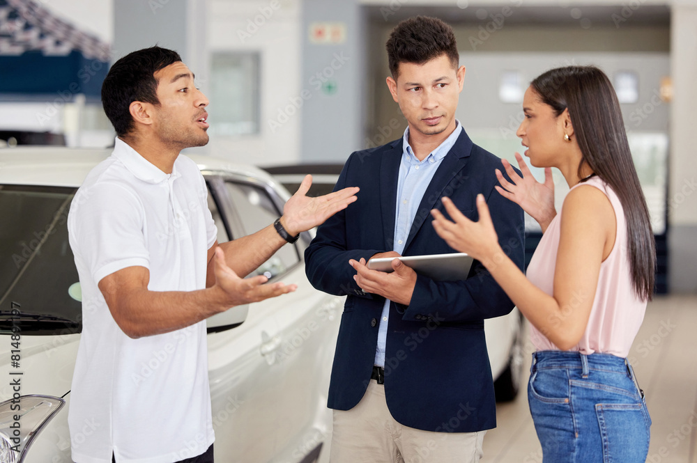 Couple, car dealership and stress with argument in discussion for and motor vehicle, finance and problem. Angry, man and woman with communication in showroom for automobile, purchase and conflict Couple, car dealership and stress with argument in discussion for and motor vehicle, finance and problem. Angry, man and woman with communication in showroom for automobile, purchase and conflict